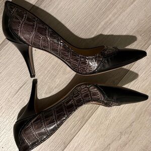 Women’s Prada pointed toe pump featuring an embossed crocodile leather texture